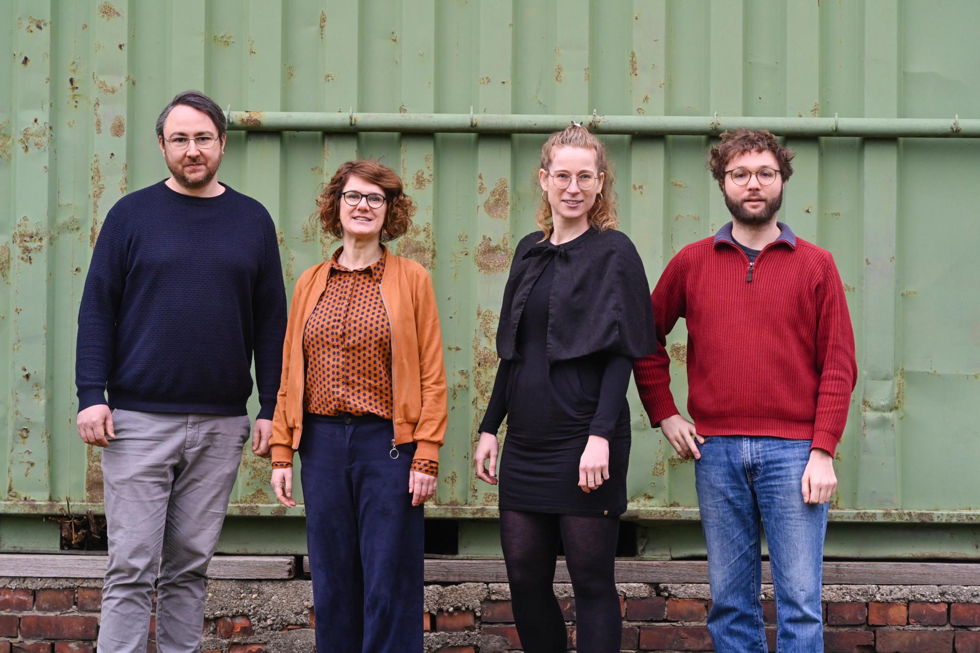 Michael McCrae, Judith Hellmann, Anne-Cathrin Lessel and Felix Worpenberg standing outside in portrait
